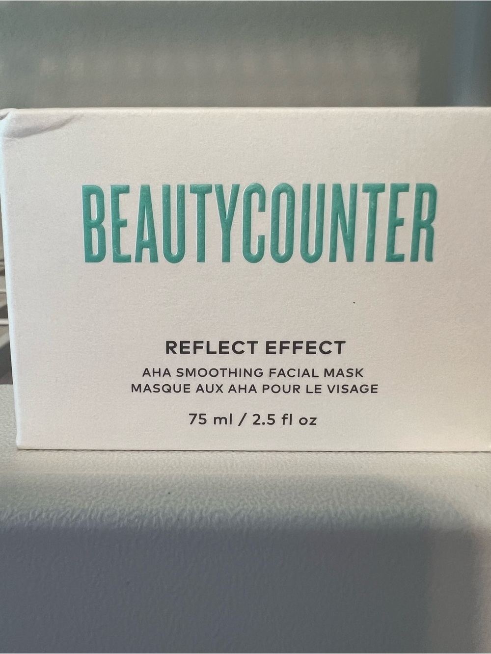 Beautycounter Teal & White Reflect Effect AHA Facial Mask